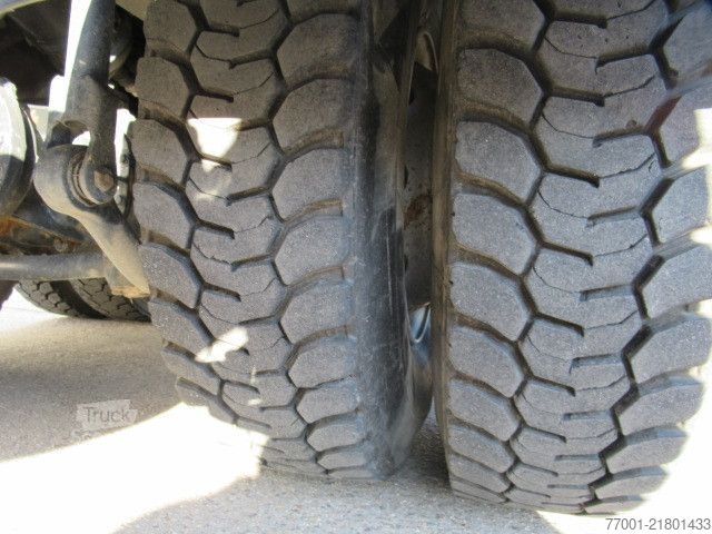 Camión volquete MAN 26.440 / 6 x 4 / Jonsered 1100 / Greifer