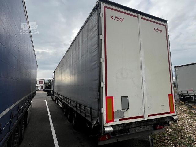 Auflieger mit Pritsche & Plane FLIEGL Mega