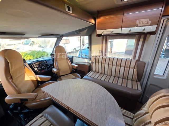 Autorulotă integrată BÜRSTNER Aviano I 709 - Einzel/Hubbett  -