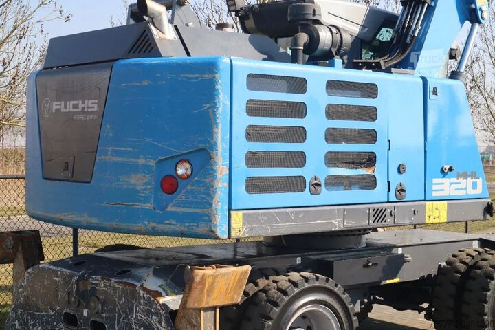 Materialumschlagmaschine Fuchs MHL 320 | PEEL GRAB | UMSCHLAG | GOOD TIRES