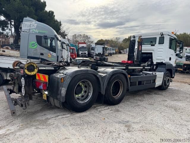 Camión volquete MAN TGS 28.460 AMPIROLL