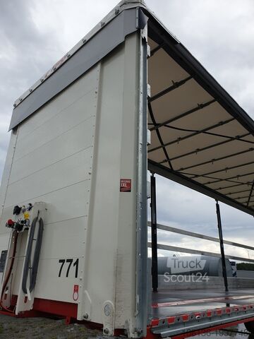 Причіп з бортовою платформою та тентом FLIEGL 3-Achs Gardine SDS 390 RoadRunner