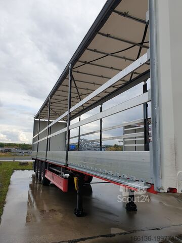 Причіп з бортовою платформою та тентом FLIEGL 3-Achs Gardine SDS 390 RoadRunner