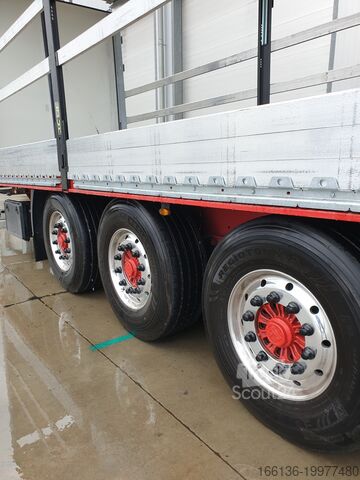 Причіп з бортовою платформою та тентом FLIEGL 3-Achs Gardine SDS 390 RoadRunner