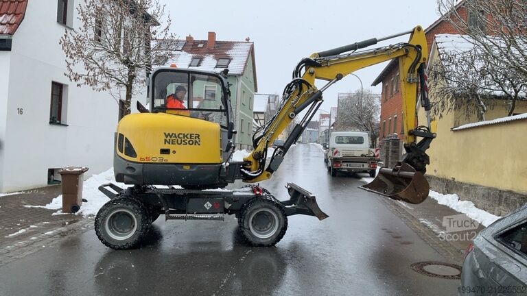 Kolesni bager Wacker Neuson 6503 with 3 excavator buckets