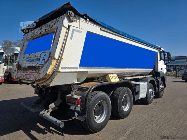 Pašizgāzējs kravas automašīna MAN TGS 35.420 8x4BB Muldenkipper Schmitz Stahl