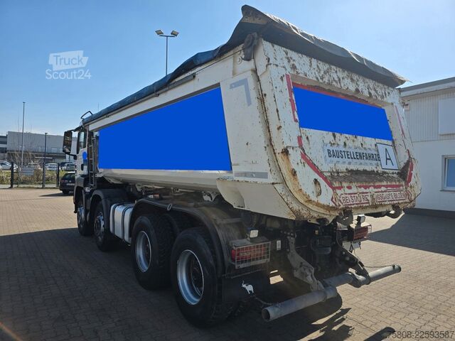 Pašizgāzējs kravas automašīna MAN TGS 35.420 8x4BB Muldenkipper Schmitz Stahl
