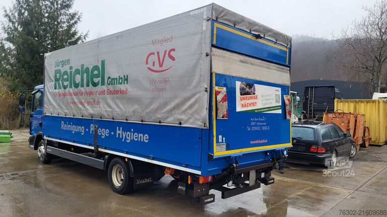 Flatbed truck with tarp MAN TGL 12.220 Pritsche/Plane LBW