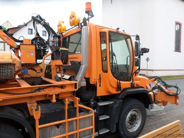 Otros MERCEDES-BENZ Unimog 423 mit Mulag Front Heckmähkombination E6