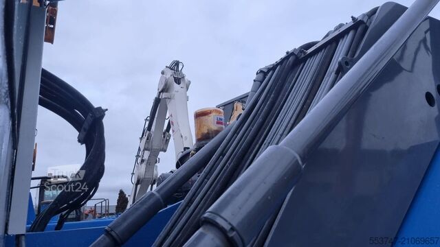 Stroj za ravnanje z materialom Fuchs MHL 320