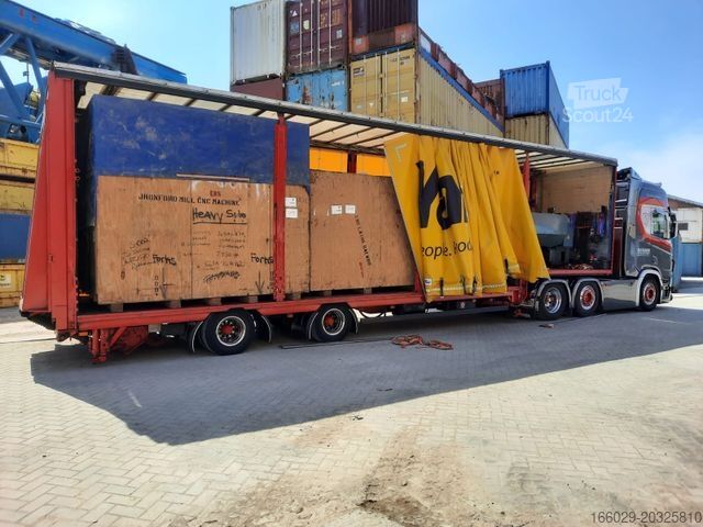 Открытый полуприцеп с тентом MEUSBURGER 2-Achs-Gabelstaplertransporter Rampe Dhollandia