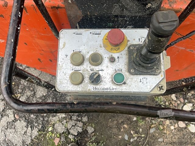 Šķēres pacēlāja galds Holland-Lift N165-12EL Combistar (16.5 m)