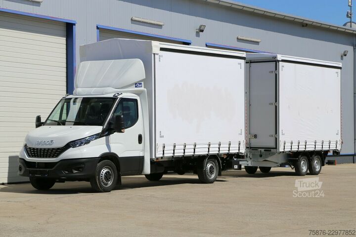 Aizkaru sānu furgons IVECO Daily  Durchladezug mit Anhänger Planenaufbau