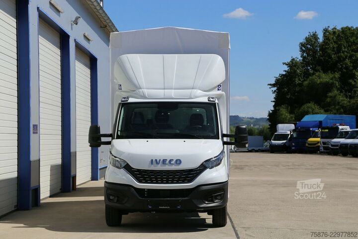 Aizkaru sānu furgons IVECO Daily  Durchladezug mit Anhänger Planenaufbau