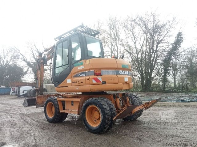 Mobiele graafmachine Case WX95 with 4 excavator buckets and forks