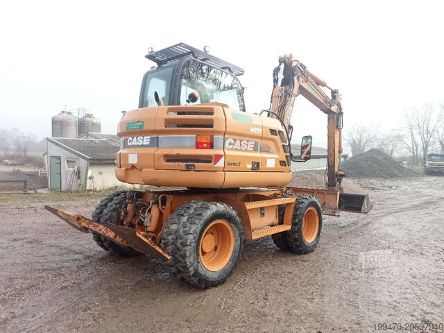 Mobiele graafmachine Case WX95 with 4 excavator buckets and forks