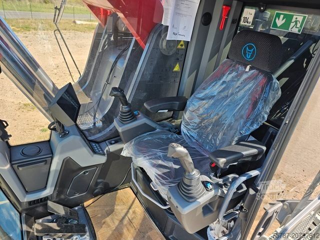 Riteņu ekskavators FUCHS mobiler Ladekran 380/390MHL mit augeräten