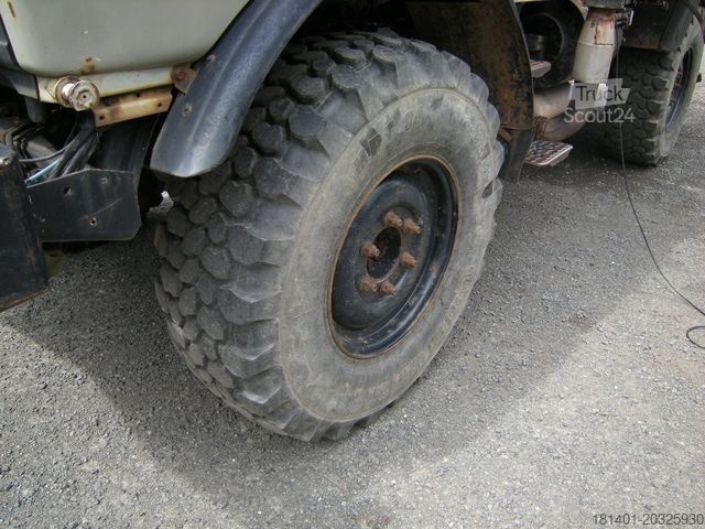 Trójstronna wywrotka UNIMOG Unimog U1250 mit Kran