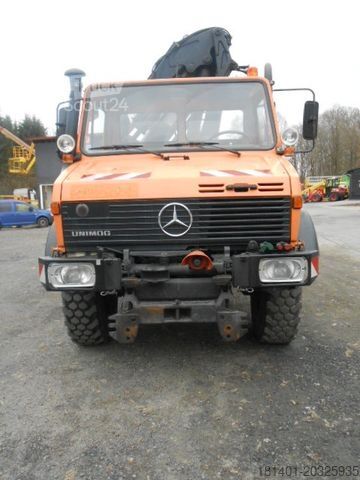 Camião basculante UNIMOG U1450 427/11 mit Kran