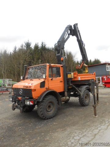 Camião basculante UNIMOG U1450 427/11 mit Kran