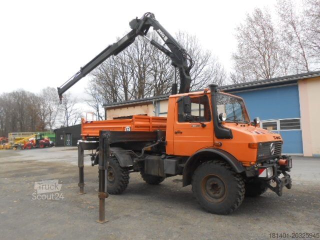 Camião basculante MERCEDES-BENZ U1450 427/11 mit Kran
