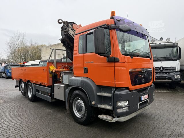 Flatbed truck MAN TGS 26.480 6X4H-2 Kran Fassi F310 18.50 Meter