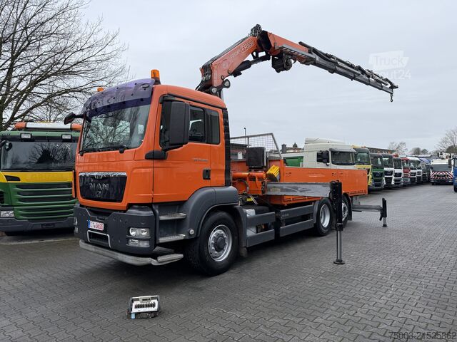 Flatbed truck MAN TGS 26.480 6X4H-2 Kran Fassi F310 18.50 Meter