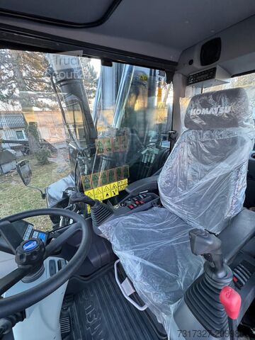 Mobile excavator Komatsu PW-180 11E0