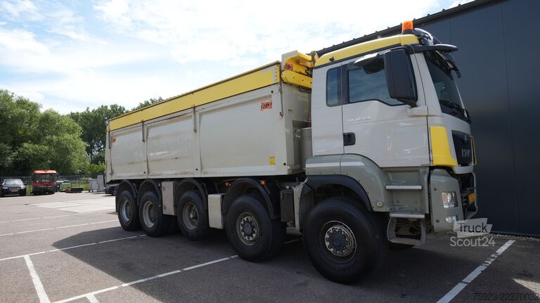 Volquete MAN TGS 49.460 10x8 tipper 413.700km