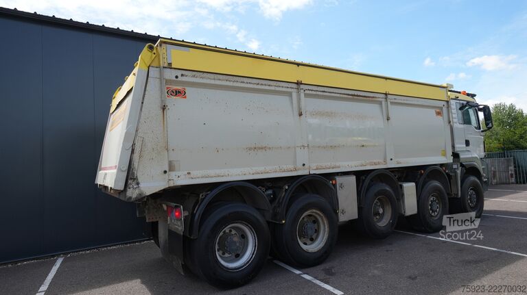 Volquete MAN TGS 49.460 10x8 tipper 413.700km