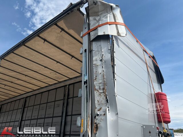 Auflieger mit Pritsche & Plane SCHMITZ CARGOBULL SCB*UNFALL*Mega Tautliner*Hubdach*