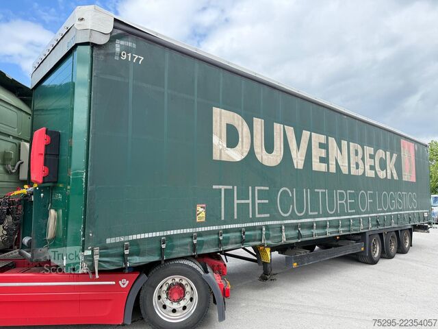 Komerciālais transportlīdzeklis Schmitz Cargobull 3 Achs Mega Trailer Hubdach top Reifen verzinkt