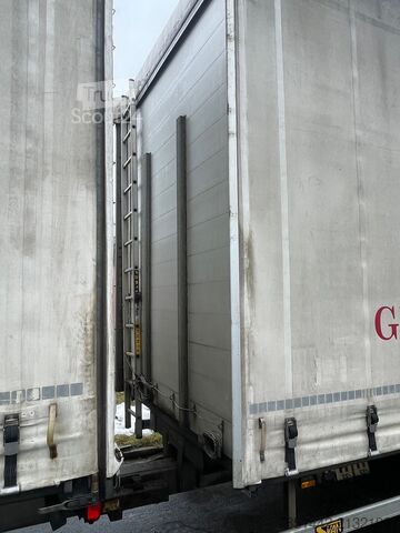 Autocarro con pianale e telone SCANIA R410