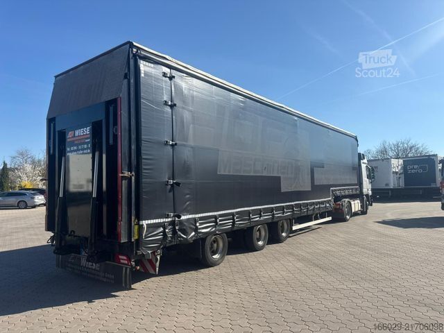 Semiremorcă cu platformă joasă  Wiese 3-Achs Stufensattel Auflieger mit Rampe25T