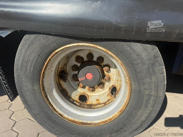 Semiremorcă cu platformă joasă  Wiese 3-Achs Stufensattel Auflieger mit Rampe25T