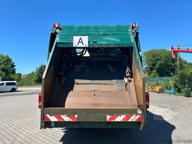 Camion à ordures MAN TGS 26.320 / 6x2 / Faun Variopress 527