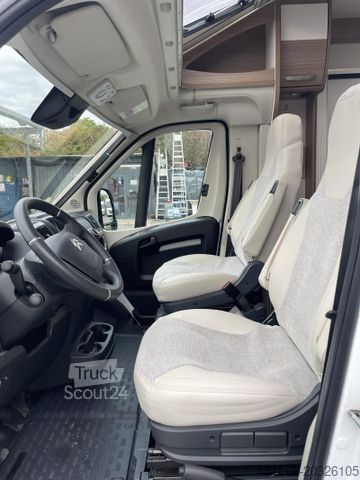 Teilintegriertes Wohnmobil CARADO T 338 Luftfederung, Dachklima, Duo Control
