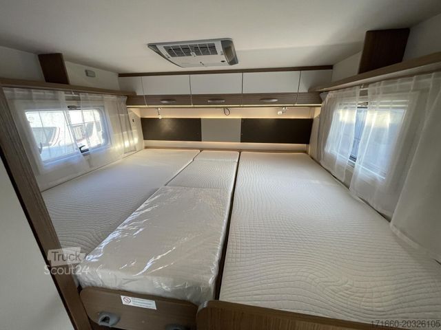 Teilintegriertes Wohnmobil CARADO T 338 Luftfederung, Dachklima, Duo Control
