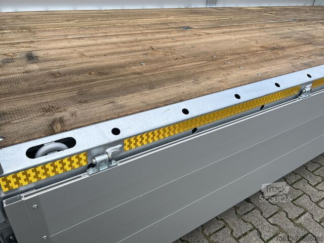 Open trailer Möslein THT 11- G 6,2  Tandem Pritsche- Tieflader mit Rungentaschen