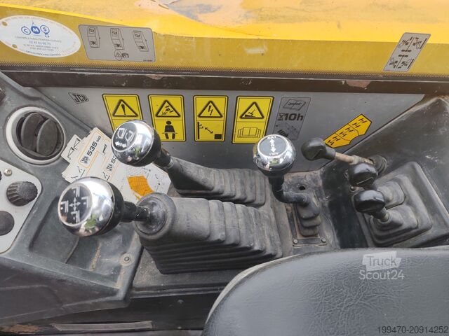 Manipulateur télescopique JCB 535-140 with forks and loading bucket
