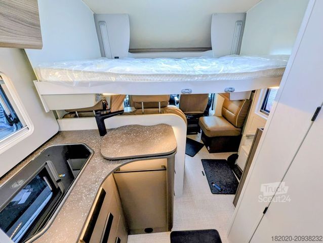 Teilintegriertes Wohnmobil BÜRSTNER B66 TD 690 G Hubbett