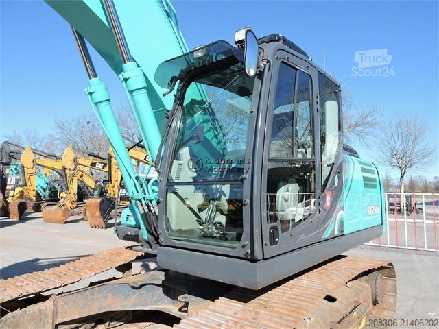 Excavatrice à chaînes KOBELCO SK210