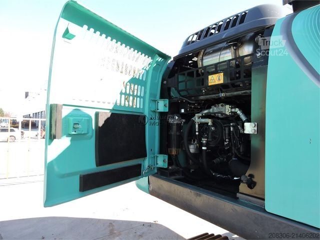 Excavatrice à chaînes KOBELCO SK210