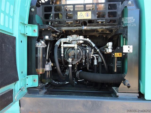 Excavatrice à chaînes KOBELCO SK210