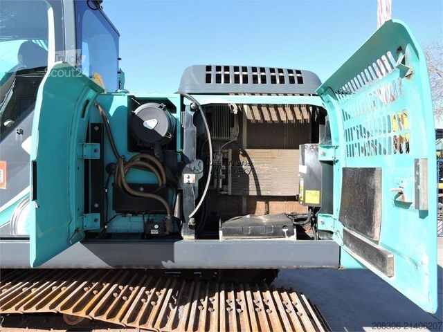 Excavatrice à chaînes KOBELCO SK210