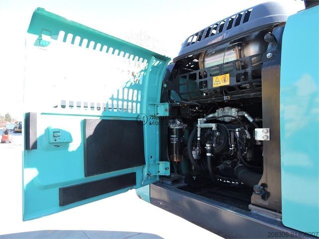 Excavatrice à chaînes KOBELCO SK210