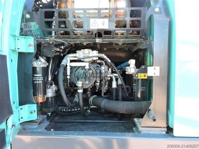 Excavatrice à chaînes KOBELCO SK210