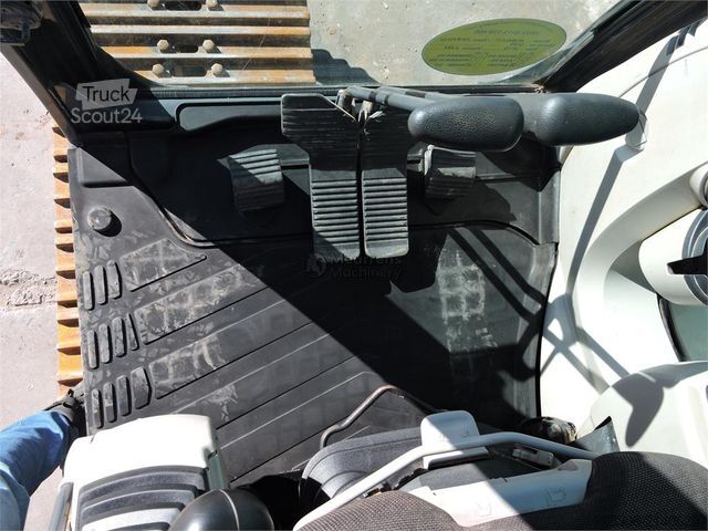 Excavatrice à chaînes KOBELCO SK210