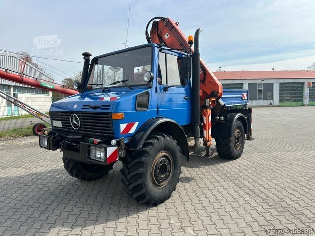 Automobilis ar plakanu platformu UNIMOG U 427 4x4 / Kran Atlas 130 / Winde
