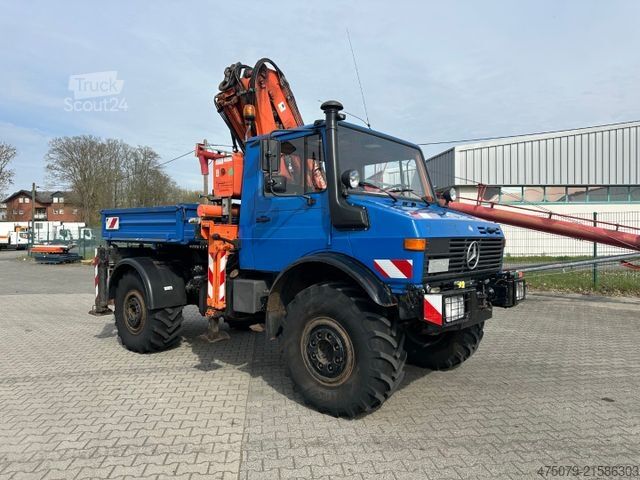 Automobilis ar plakanu platformu UNIMOG U 427 4x4 / Kran Atlas 130 / Winde